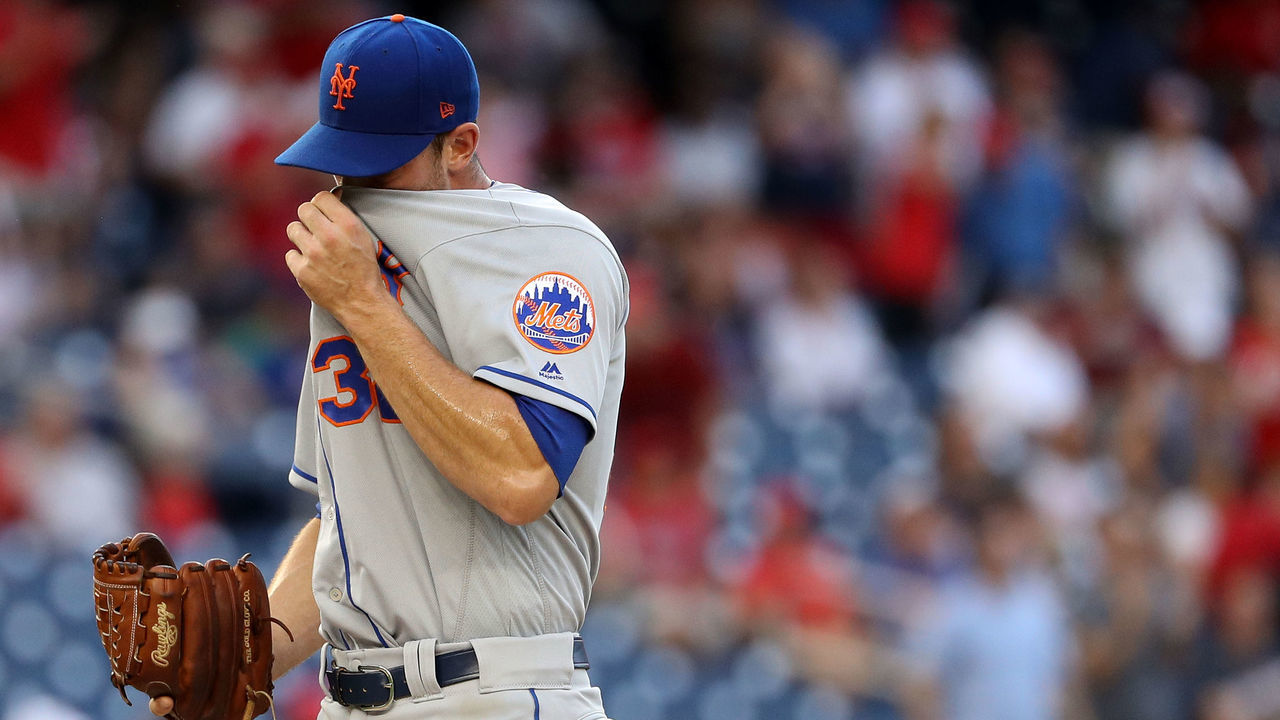 WASHINGTON, DC - JULY 31: Starting pitcher Steven Matz #32 of the New York Mets reacts after allowing a hit to Tanner Roark #57 of the Washington Nationals (not pictured) during the first inning at Nationals Park on July 31, 2018 in Washington, DC.