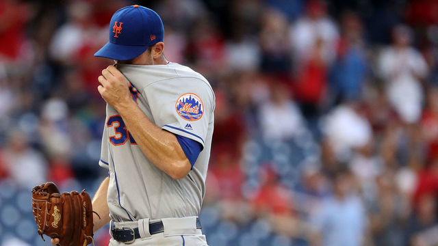 WASHINGTON, DC - JULY 31: Starting pitcher Steven Matz #32 of the New York Mets reacts after allowing a hit to Tanner Roark #57 of the Washington Nationals (not pictured) during the first inning at Nationals Park on July 31, 2018 in Washington, DC.