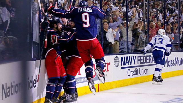 COLUMBUS, OH - APRIL 16: Oliver Bjorkstrand #28 of the Columbus Blue Jackets is congratulated by his teammates after scoring a goal during Game Four of the Eastern Conference First Round during the 2019 NHL Stanley Cup Playoffs against the Tampa Bay Lightning on April 16, 2019 at Nationwide Arena in Columbus, Ohio.