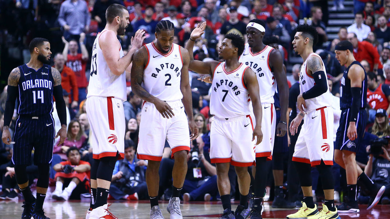 TORONTO, ON - APRIL 16: Kyle Lowry #7 of the Toronto Raptors high fives Marc Gasol #33 during Game Two of the first round of the 2019 NBA Playoffs against the Orlando Magic at Scotiabank Arena on April 16, 2019 in Toronto, Canada.