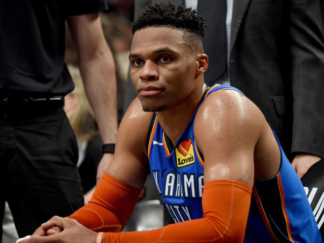 PORTLAND, OR - APRIL 16: Russell Westbrook #0 of the Oklahoma City Thunder looks on from the bench during the second half of Game Two of the Western Conference quarterfinals Portland Trail Blazers during the 2019 NBA Playoffs Moda Center on April 16, 2019 in Portland, Oregon. The Blazers won 114-94.