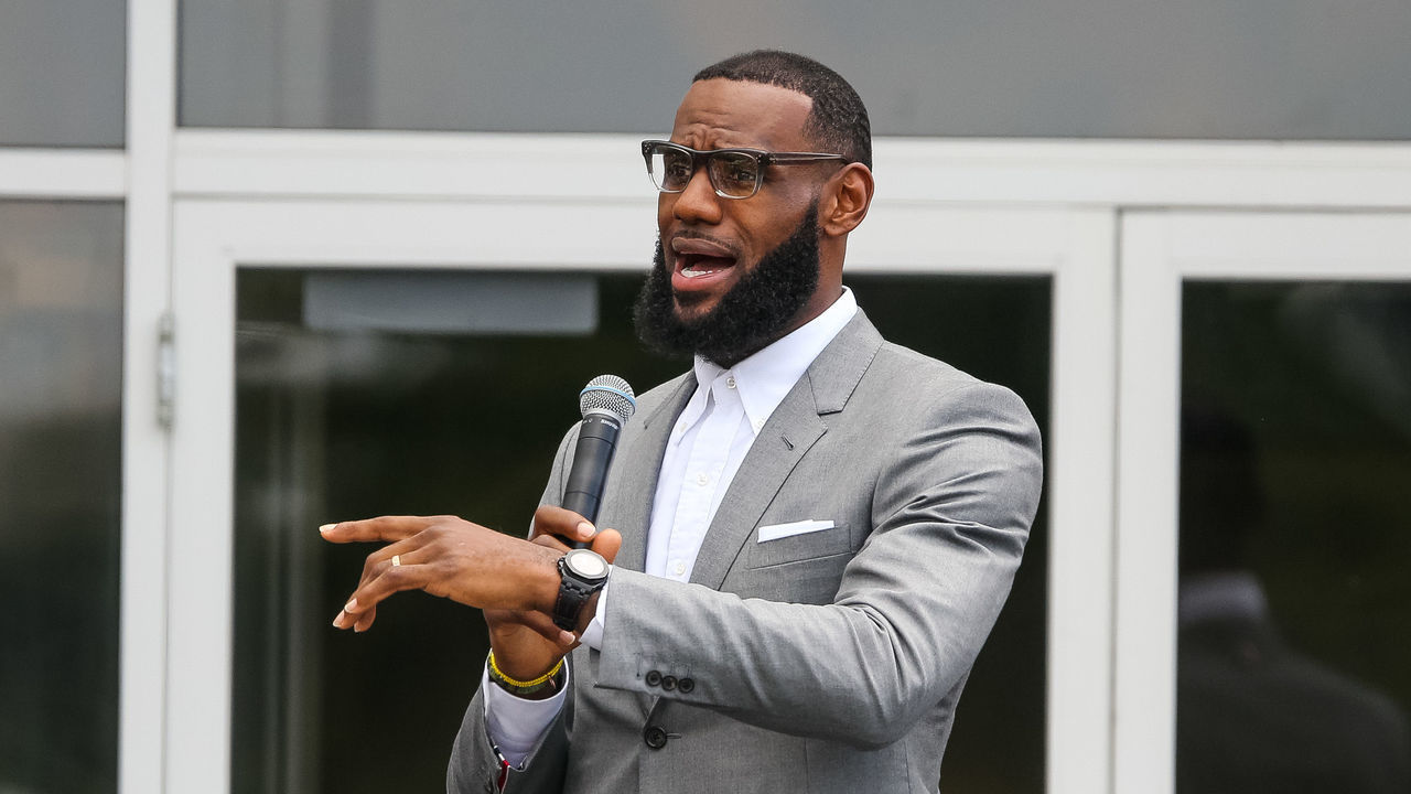AKRON, OH - JULY 30: LeBron James addresses a crowd of students, parents, local officials and sponsors at the grand opening of the I Promise school on July 30, 2018 in Akron, Ohio. The new school is a partnership between the LeBron James Family foundation and Akron Public Schools. NOTE TO USER: User expressly acknowledges and agrees that, by downloading and/or using this Photograph, user is consenting to the terms and conditions of the Getty Images License Agreement. Mandatory Copyright Notice: Copyright 2018 NBAE