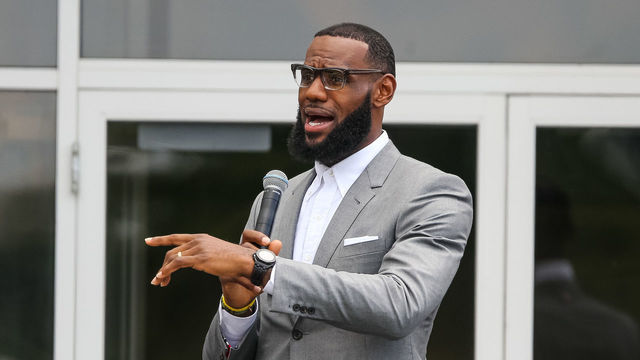 AKRON, OH - JULY 30: LeBron James addresses a crowd of students, parents, local officials and sponsors at the grand opening of the I Promise school on July 30, 2018 in Akron, Ohio. The new school is a partnership between the LeBron James Family foundation and Akron Public Schools. NOTE TO USER: User expressly acknowledges and agrees that, by downloading and/or using this Photograph, user is consenting to the terms and conditions of the Getty Images License Agreement. Mandatory Copyright Notice: Copyright 2018 NBAE