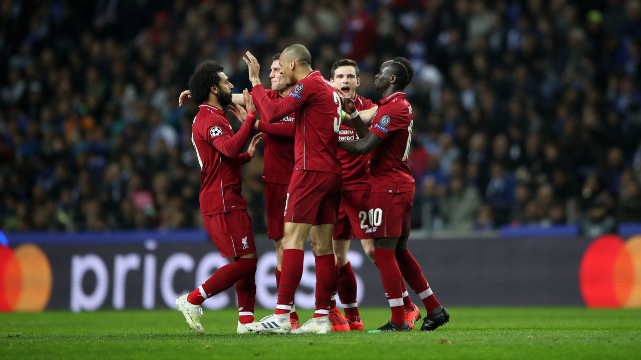 Liverpool's Sadio Mane (right) celebrates scoring his side's first goal of the game FC Porto v Liverpool - UEFA Champions League - Quarter Final - Second Leg - Estadio do Dragao 17-04-2019 .