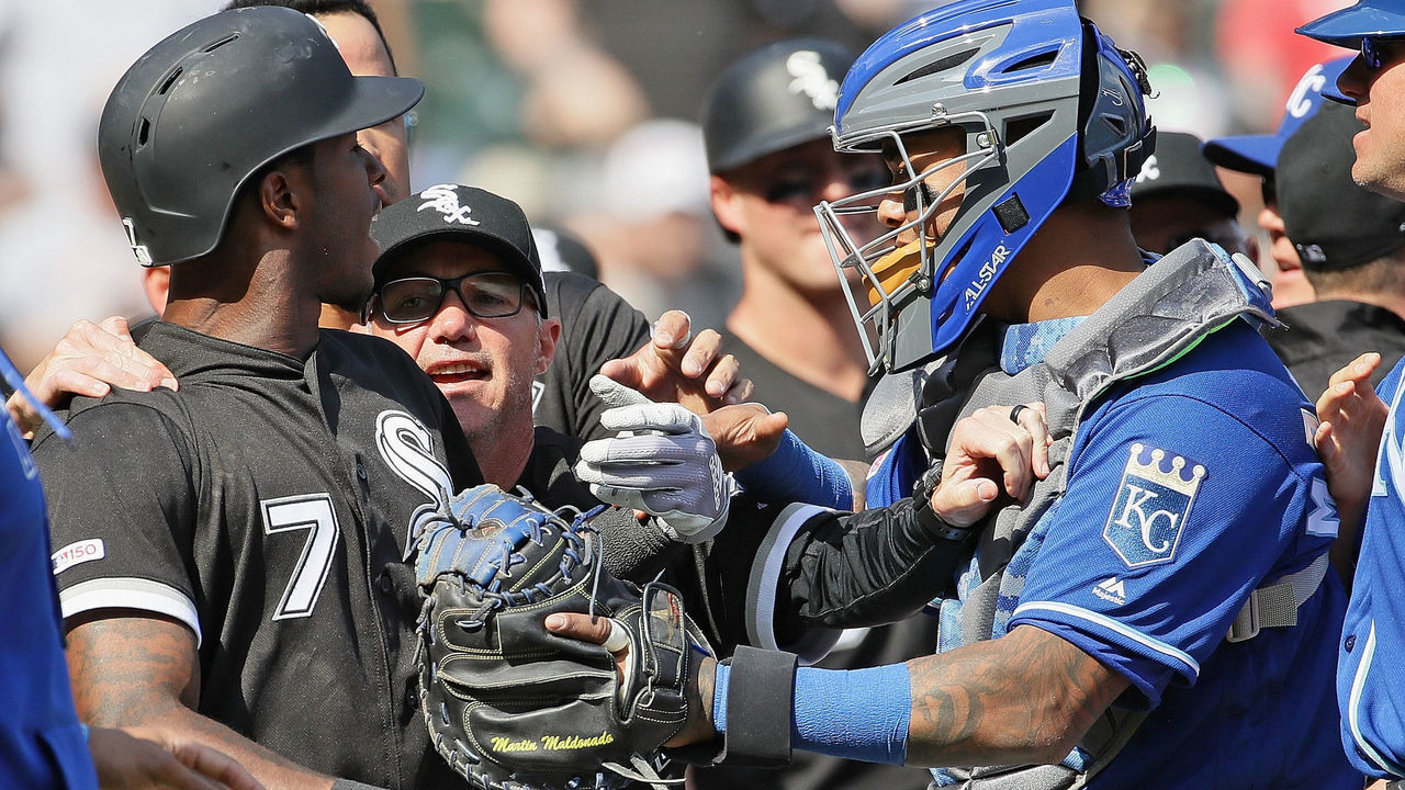 CHICAGO, ILLINOIS - APRIL 17: Martin Maldonado #16 of the Kansas City Royals blocks Tim Anderson #7 of the Chicago White Sox from charging the mound in the 6th inning at Guaranteed Rate Field on April 17, 2019 in Chicago, Illinois.
