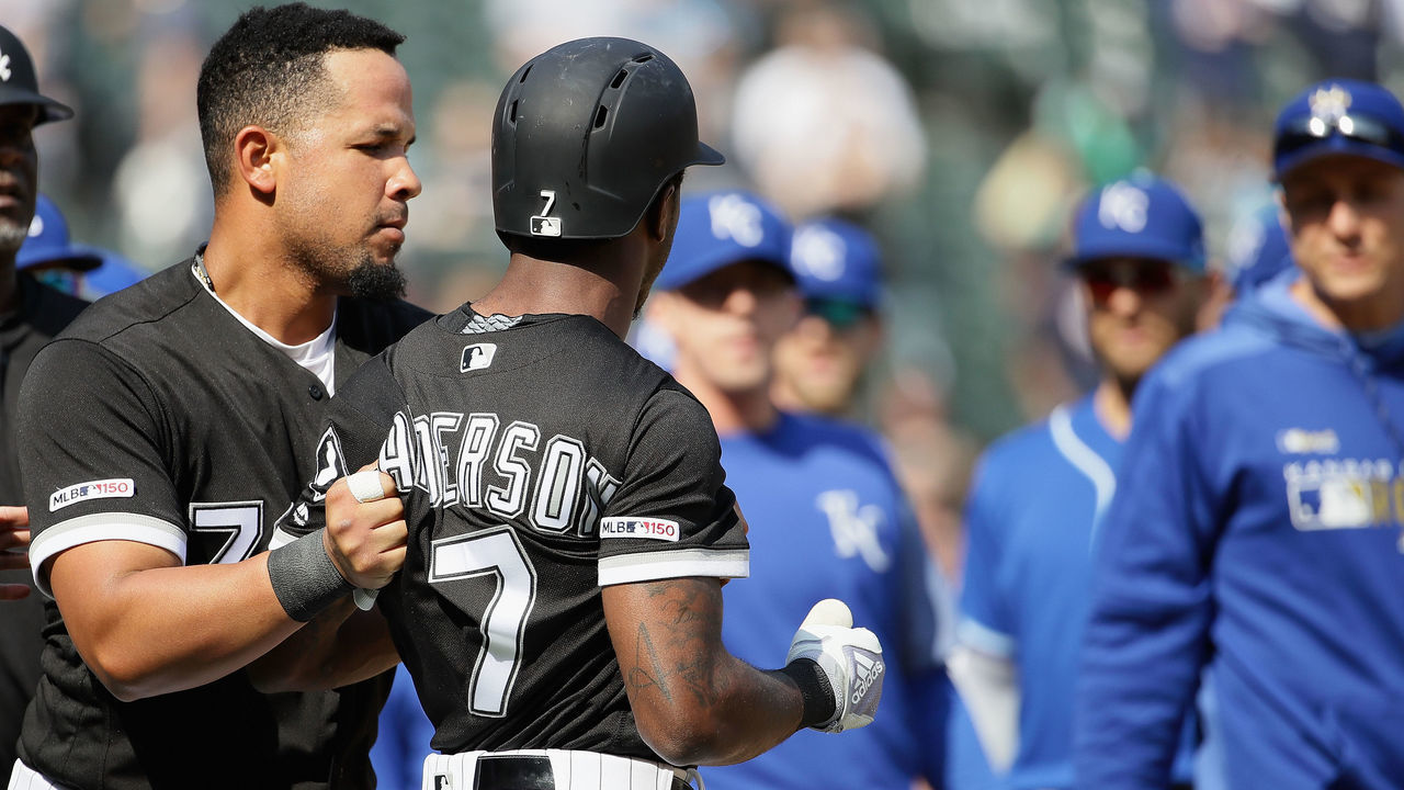 CHICAGO, ILLINOIS - APRIL 17: Jose Abreu #79 of the Chicago White Sox holds back teammate Tim Anderson #7 during an altercation with the Kansas City Royals in the 6th inning at Guaranteed Rate Field on April 17, 2019 in Chicago, Illinois.