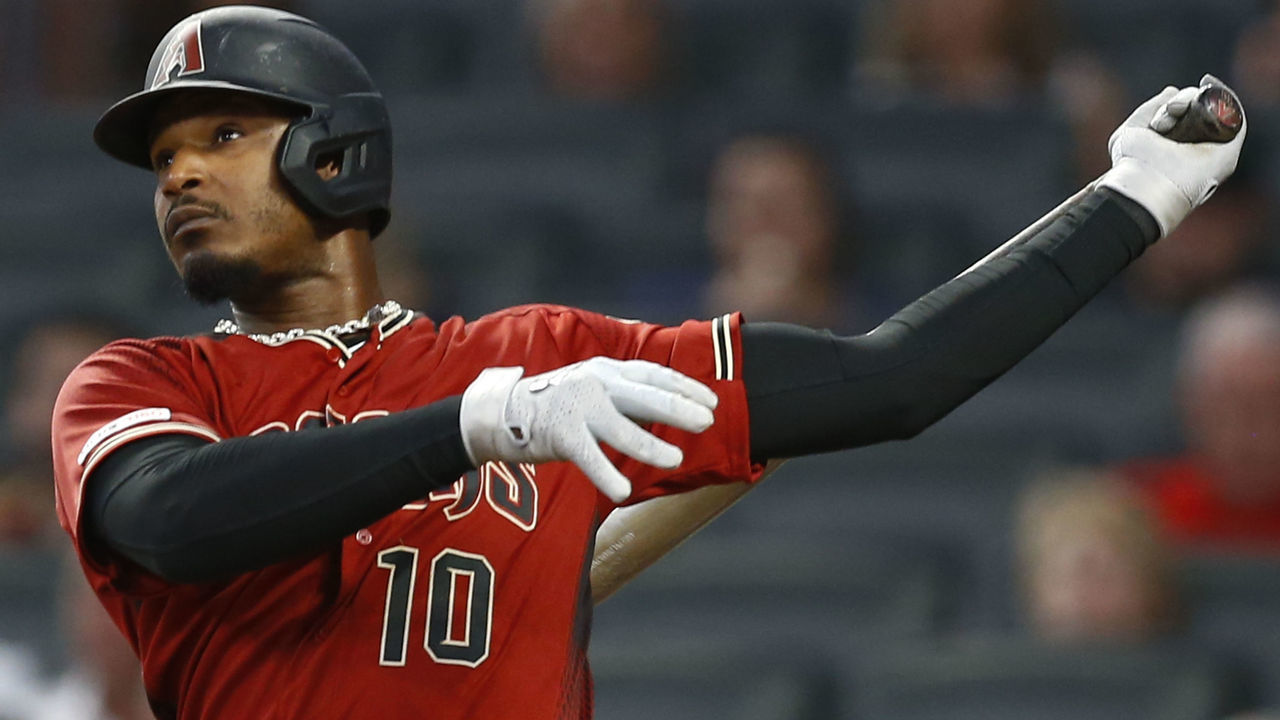 ATLANTA, GEORGIA - APRIL 17: Right fielder Adam Jones #10 of the Arizona Diamondbacks hits a solo home run in the fourth inning during the game against the Atlanta Braves at SunTrust Park on April 17, 2019 in Atlanta, Georgia.