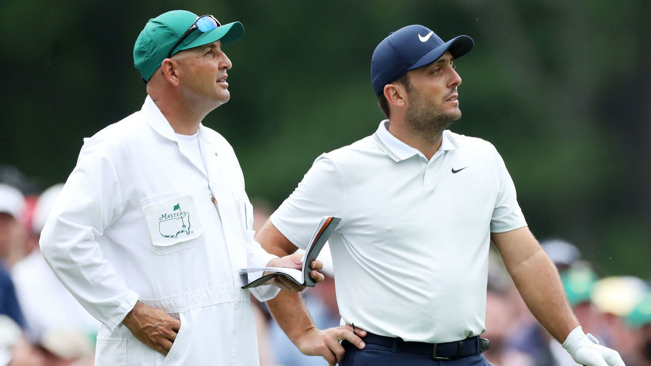 AUGUSTA, GEORGIA - APRIL 14: Francesco Molinari of Italy and caddie Pello Iguaran wait on the 12th tee during the final round of the Masters at Augusta National Golf Club on April 14, 2019 in Augusta, Georgia.