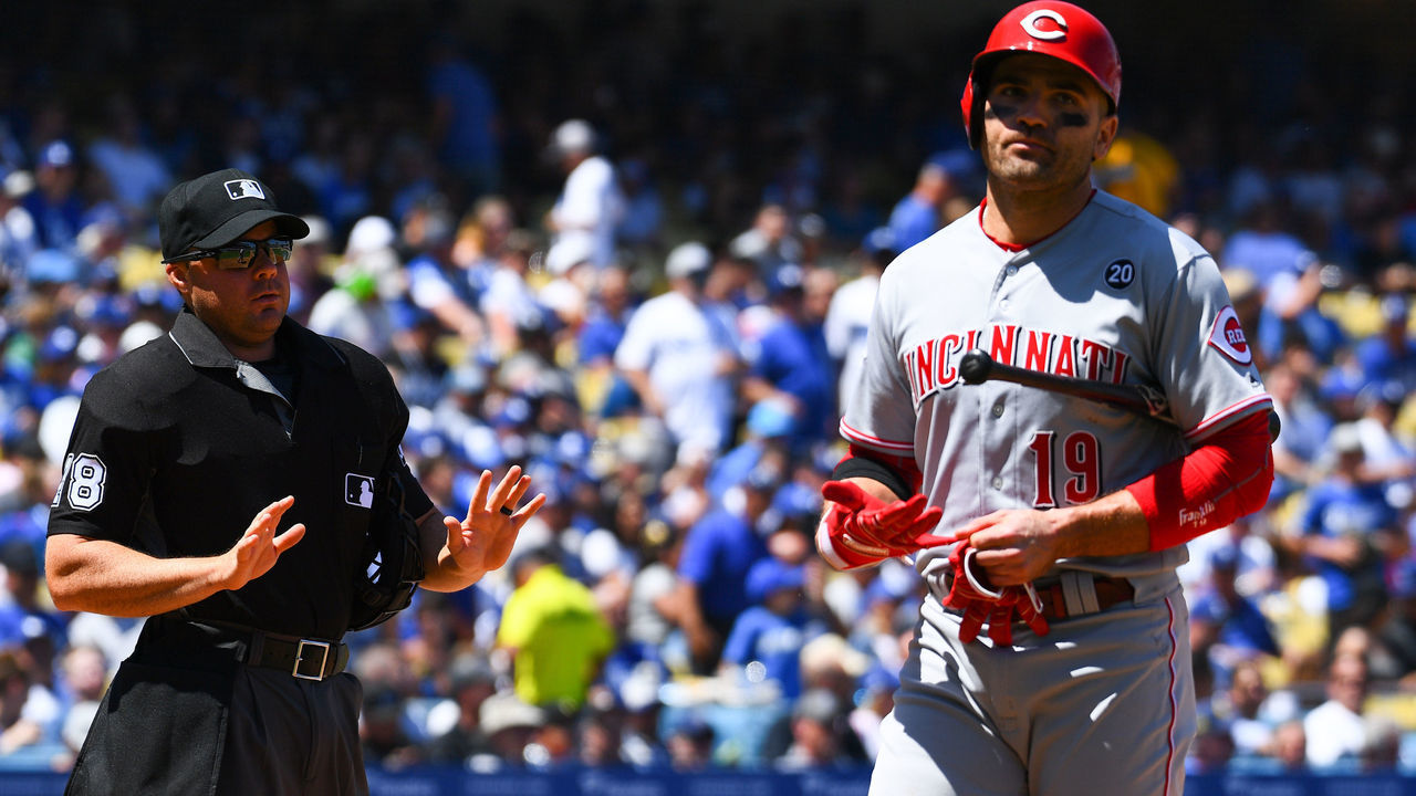 LOS ANGELES, CA - APRIL 17: Home plate umpire tells Cincinnati Reds first baseman Joey Votto (19) to relax during a MLB game between the Cincinnati Reds and the Los Angeles Dodgers on April 17, 2019 at Dodger Stadium in Los Angeles, CA.