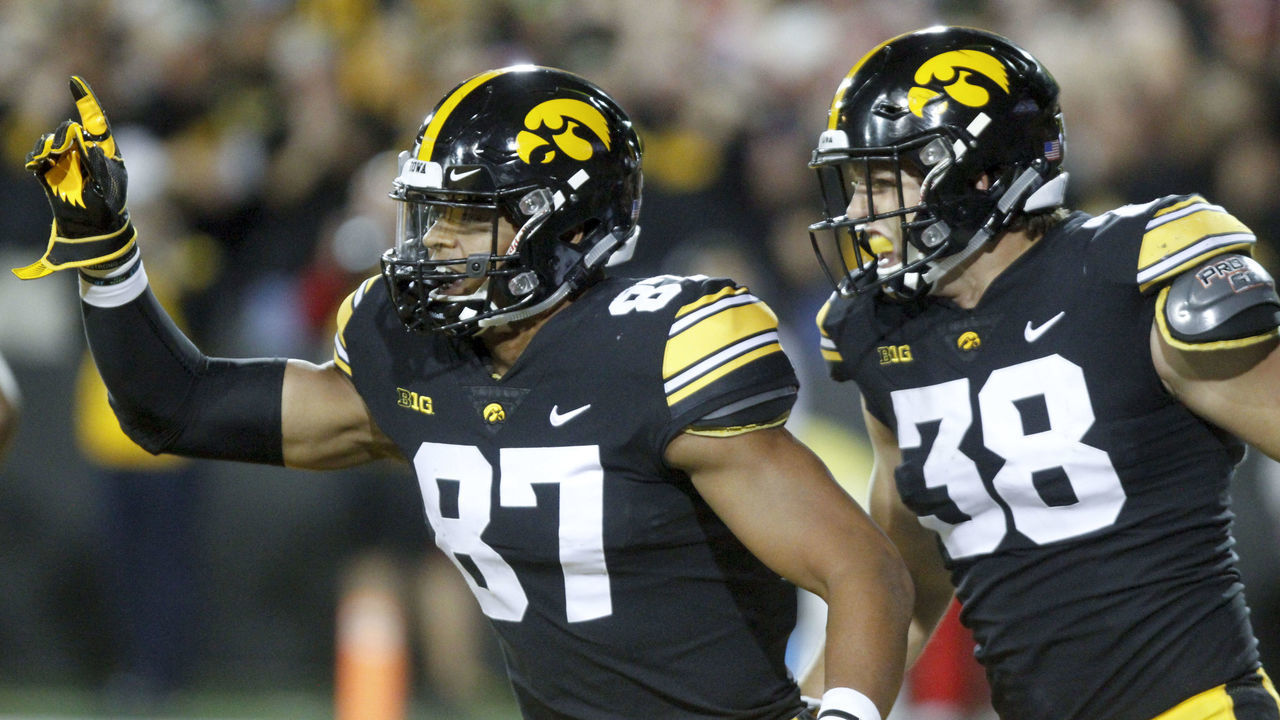 IOWA CITY, IOWA- SEPTEMBER 22: Tight ends Noah Fant #87 and T.J. Hockenson #38 of the Iowa Hawkeyes celebrate a touchdown during the first half against the Wisconsin Badgers on September 22, 2018 at Kinnick Stadium, in Iowa City, Iowa.