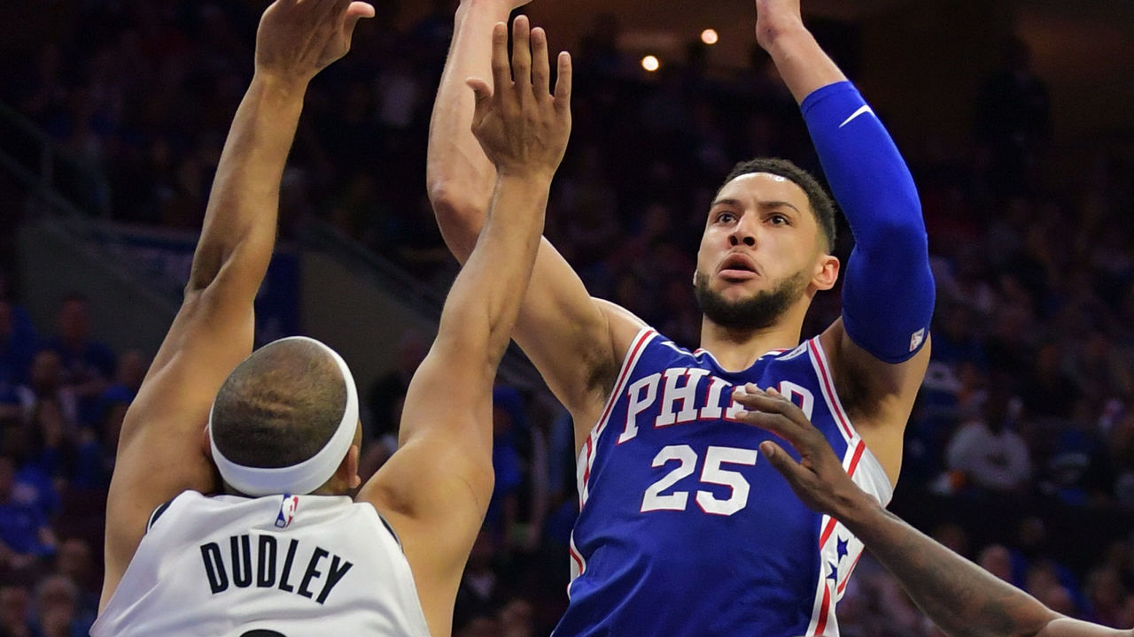 PHILADELPHIA, PA - APRIL 13: Ben Simmons #25 of the Philadelphia 76ers puts up a shot over Jared Dudley #6 of the Brooklyn Nets in the second half during Game One of the first round of the 2019 NBA Playoff at Wells Fargo Center on April 13, 2019 in Philadelphia, Pennsylvania. The Nets won 111-102.