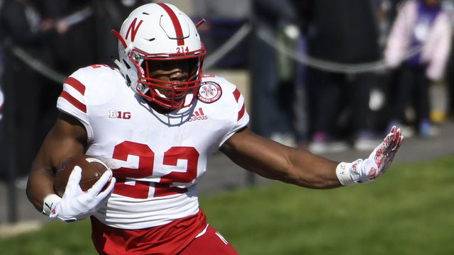 EVANSTON, IL- OCTOBER 13: Devine Ozigbo #22 of the Nebraska Cornhuskers runs against the Northwestern Wildcats during the first half on October 13, 2018 at Ryan Field in Evanston, Illinois.