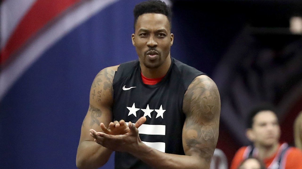 WASHINGTON, DC - APRIL 09: Dwight Howard #21 of the Washington Wizards watches from the bench in the first half against the Boston Celtics at Capital One Arena on April 09, 2019 in Washington, DC.