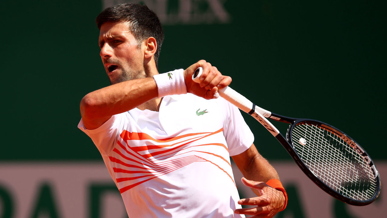 MONTE-CARLO, MONACO - APRIL 19: Novak Djokovic of Serbia plays a forehand against Daniil Medvedev of Russia in their quarter final match during day six of the Rolex Monte-Carlo Masters at Monte-Carlo Country Club on April 19, 2019 in Monte-Carlo, Monaco.