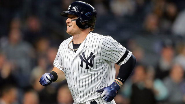 BRONX, NY - APRIL 16: Clint Frazier #77 of the New York Yankees smiles after hitting a solo home run in the fourth inning during the game between the Boston Red Sox and the New York Yankees at Yankee Stadium on Tuesday, April 16, 2019 in the Bronx borough of New York City.