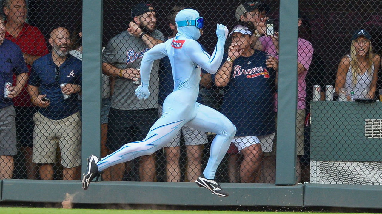 ATLANTA, GA JULY 14: Atlanta entertainment 'The Freeze' runs against a fan in between innings during the game between Atlanta and Arizona on July 14th, 2018 at SunTrust Park in Atlanta, GA. The Arizona Diamondbacks beat the Atlanta Braves by a score of 3 0.