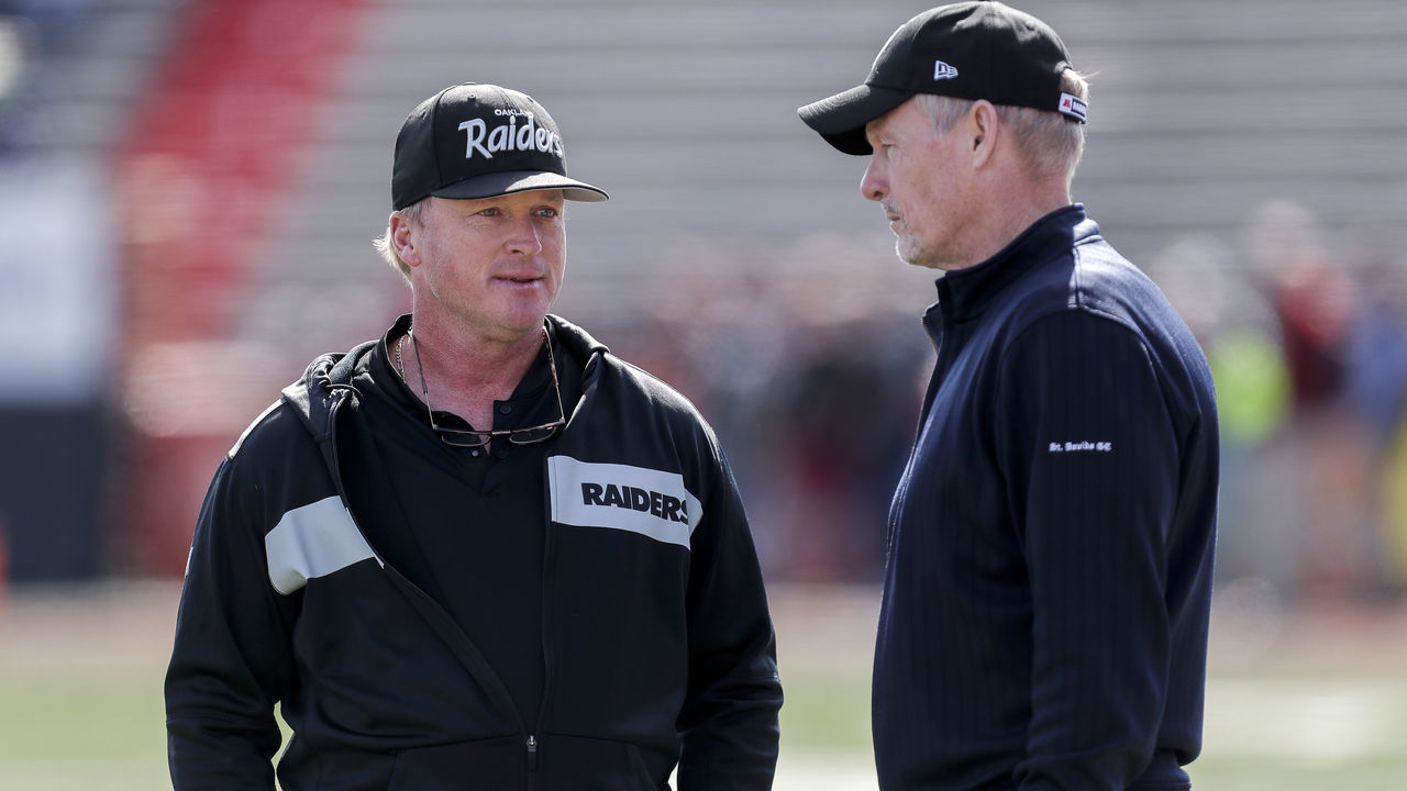 MOBILE, AL - JANUARY 26: Head Coach Jon Gruden and General Manager Mike Mayock of the Oakland Raiders of the North Team talk before the start of the 2019 Reese's Senior Bowl at Ladd-Peebles Stadium on January 26, 2019 in Mobile, Alabama. The North defeated the South 34 to 24.