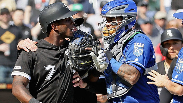 CHICAGO, ILLINOIS - APRIL 17: Martin Maldonado #16 of the Kansas City Royals blocks Tim Anderson #7 of the Chicago White Sox from charging the mound in the 6th inning at Guaranteed Rate Field on April 17, 2019 in Chicago, Illinois.