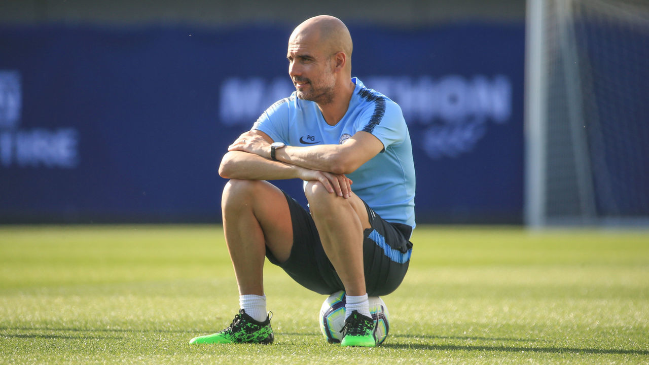 MANCHESTER, ENGLAND - APRIL 19: Manchester City's Pep Guardiola looks on during training at Manchester City Football Academy on April 19, 2019 in Manchester, England.