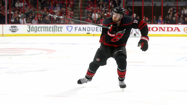 RALEIGH, NC - APRIL 15: Warren Foegele #13 of the Carolina Hurricanes skates for position on the ice in Game Three of the Eastern Conference First Round during the 2019 NHL Stanley Cup Playoffs against the Washington Capitals on April 15, 2019 at PNC Arena in Raleigh, North Carolina.
