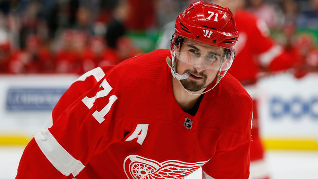 DETROIT, MI - FEBRUARY 24: Detroit Red Wings forward Dylan Larkin (71) looks on during a regular season NHL hockey game between the San Jose Sharks and the Detroit Red Wings on February 24, 2019. at Little Caesars Arena in Detroit, Michigan.