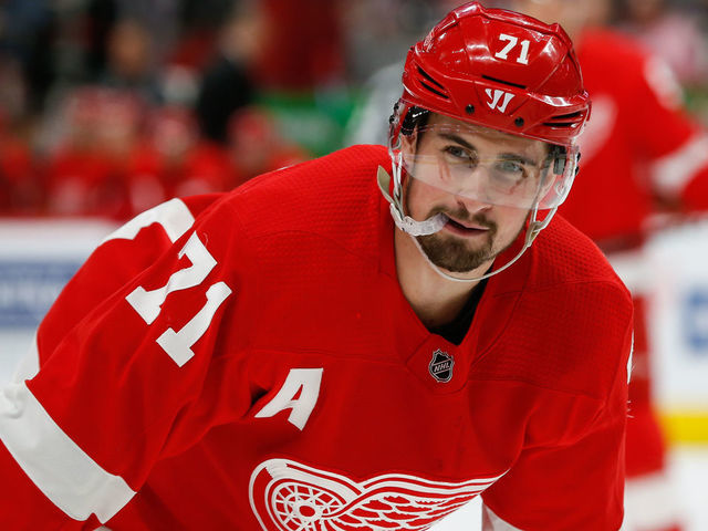 DETROIT, MI - FEBRUARY 24: Detroit Red Wings forward Dylan Larkin (71) looks on during a regular season NHL hockey game between the San Jose Sharks and the Detroit Red Wings on February 24, 2019. at Little Caesars Arena in Detroit, Michigan.