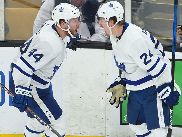 BOSTON, MA - APRIL 19: Morgan Rielly #44 and Kasperi Kapanen #24 of the Toronto Maple Leafs celebrate their goal against the Boston Bruins in Game Five of the Eastern Conference First Round during the 2019 NHL Stanley Cup Playoffs at the TD Garden on April 19, 2019 in Boston, Massachusetts.