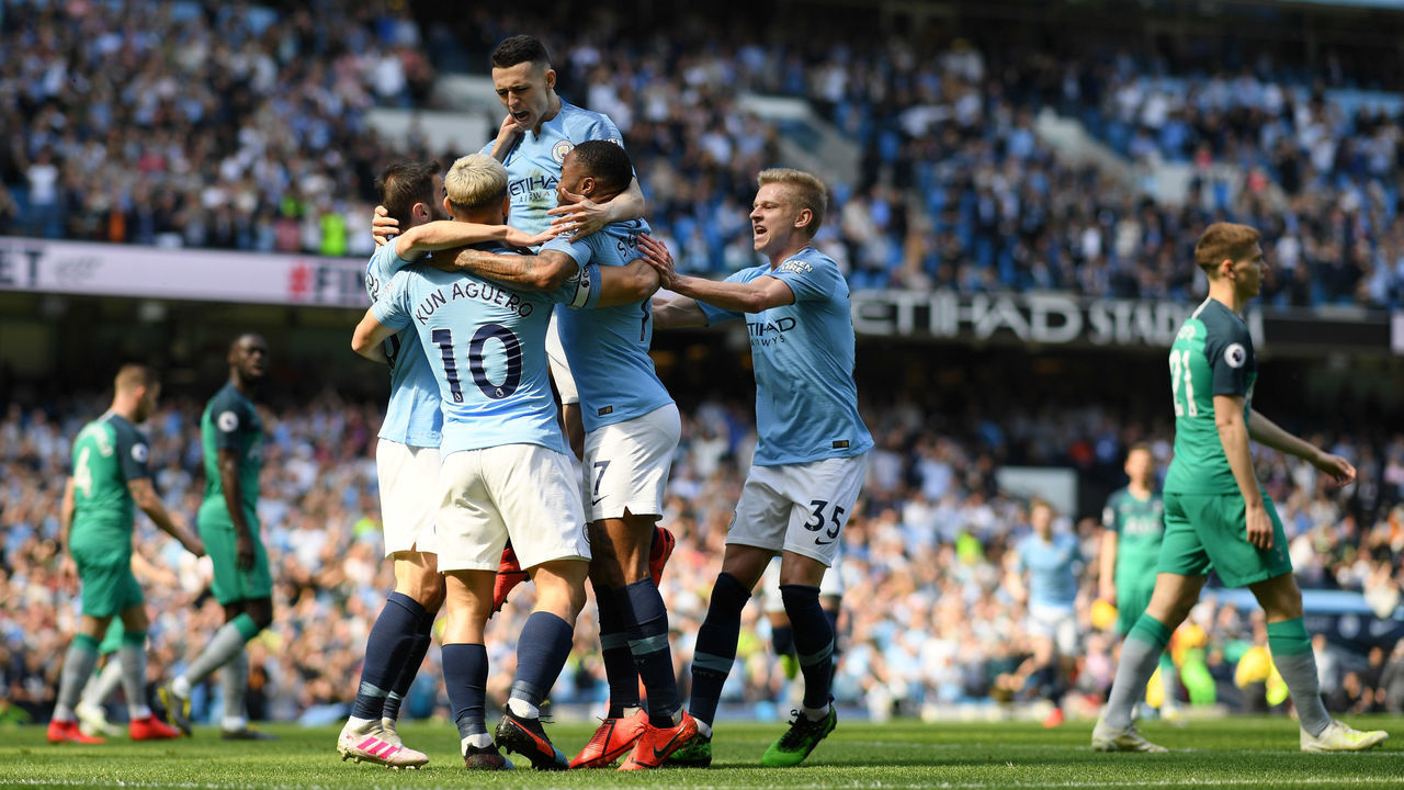 MANCHESTER, ENGLAND - APRIL 20: Phil Foden of Manchester City celebrates with teammates after scoring his team's first goal during the Premier League match between Manchester City and Tottenham Hotspur at Etihad Stadium on April 20, 2019 in Manchester, United Kingdom.