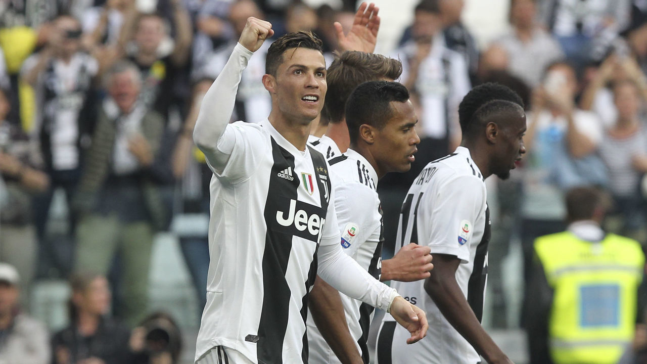 Cristiano Ronaldo (Juventus FC) celerates after the own goal of Germn Pezzella (ACF Fiorentina) during the Serie A football match between Juventus FC and ACF Fiorentina at Allianz Stadium on April 20, 2018 in Turin, Italy. Juventus won 2-1 against Fiorentina and confirmed themselves as Champion of Italy for the eighth consecutive time.