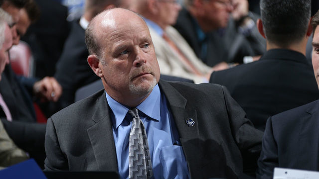 SUNRISE, FL - JUNE 26: Director of Player Personnel of the Toronto Maple Leafs Mark Hunter looks on from the Leafs' draft table during Round One of the 2015 NHL Draft at BB&T Center on June 26, 2015 in Sunrise, Florida.