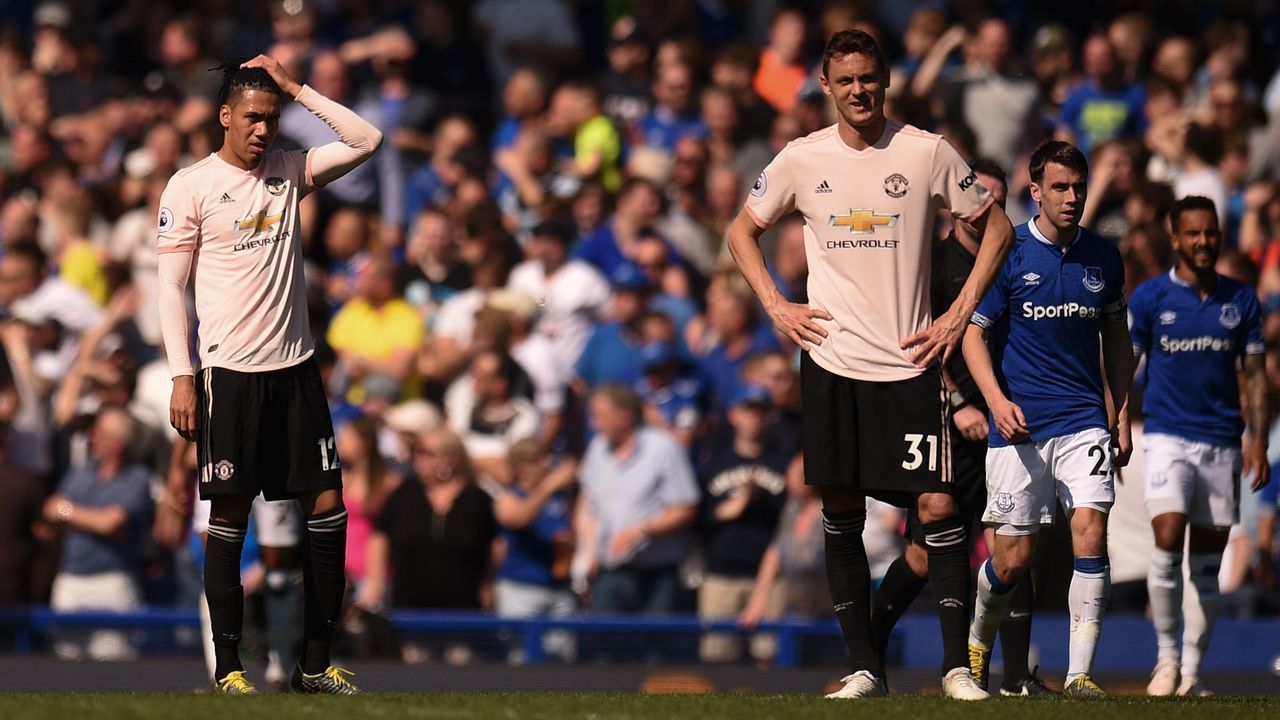 Manchester United's English defender Chris Smalling (C) reacts after Everton's fourth goal during the English Premier League football match between Everton and Manchester United at Goodison Park in Liverpool, north west England on April 21, 2019.