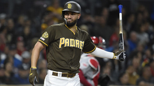 SAN DIEGO, CA - APRIL 19: Eric Hosmer #30 of the San Diego Padres tosses his bat after striking out swinging during the eighth inning of a baseball game against the Cincinnati Reds at Petco Park April 19, 2019 in San Diego, California.