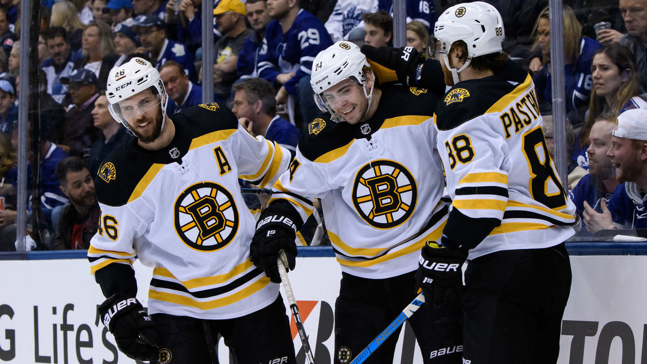 TORONTO, ON - APRIL 21: Boston Bruins Right Wing Jake Debrusk (74) celebrates his goal with teammates Right Wing David Pastrnak (88) and Center David Krejci (46) during the second period of Game 6 of the First Round Stanley Cup Playoffs series between the Boston Bruins and the Toronto Maple Leafs on April 21, 2019, at Scotiabank Arena in Toronto, ON.