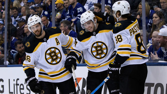TORONTO, ON - APRIL 21: Boston Bruins Right Wing Jake Debrusk (74) celebrates his goal with teammates Right Wing David Pastrnak (88) and Center David Krejci (46) during the second period of Game 6 of the First Round Stanley Cup Playoffs series between the Boston Bruins and the Toronto Maple Leafs on April 21, 2019, at Scotiabank Arena in Toronto, ON.