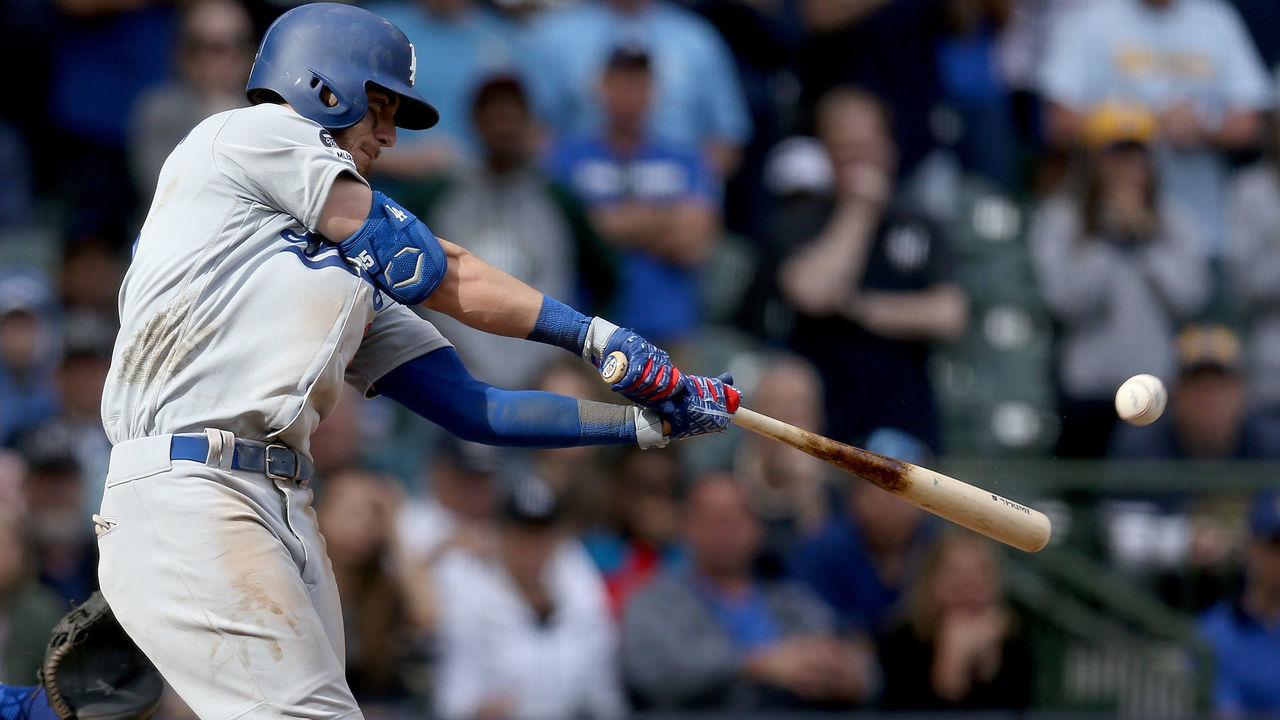 MILWAUKEE, WISCONSIN - APRIL 21: Cody Bellinger #35 of the Los Angeles Dodgers hits a home run in the ninth inning against the Milwaukee Brewers at Miller Park on April 21, 2019 in Milwaukee, Wisconsin.