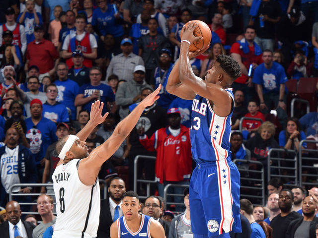 PHILADELPHIA, PA - APRIL 13: Jimmy Butler #23 of the Philadelphia 76ers shoots a three-pointer against Jared Dudley #6 of the Brooklyn Nets during Game One of Round One of the 2019 NBA Playoffs on April 13, 2019 at the Wells Fargo Center in Philadelphia, Pennsylvania NOTE TO USER: User expressly acknowledges and agrees that, by downloading and/or using this Photograph, user is consenting to the terms and conditions of the Getty Images License Agreement. Mandatory Copyright Notice: Copyright 2019 NBAE