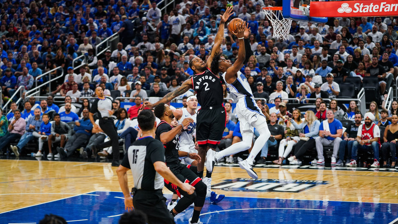 ORLANDO, FLORIDA - APRIL 21: Kawhi Leonard #2 of the Toronto Raptors blocks Wes Iwundu #25 of the Orlando Magic during a game at Amway Center on April 21, 2019 in Orlando, Florida.