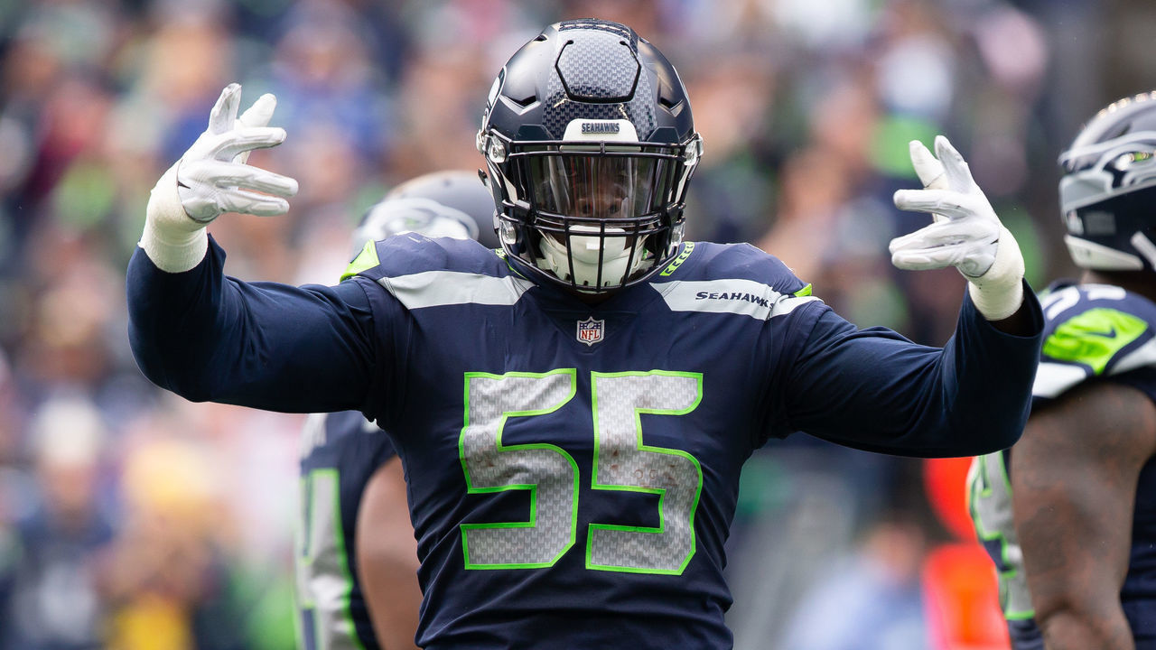 SEATTLE, WA - OCTOBER 7: Seattle Seahawks defensive end Frank Clark (55) gets the crowd pumped up in the second quarter during a game between the Los Angeles Rams and the Seattle Seahawks on October 7, 2018 at CenturyLink Field in Seattle, WA.