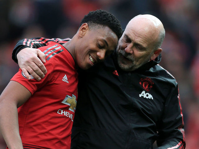 MANCHESTER, ENGLAND - APRIL 13: Man Utd assistant Mike Phelan puts his arm around Anthony Martial of Man Utd after the Premier League match between Manchester United and West Ham United at Old Trafford on April 13, 2019 in Manchester, United Kingdom.