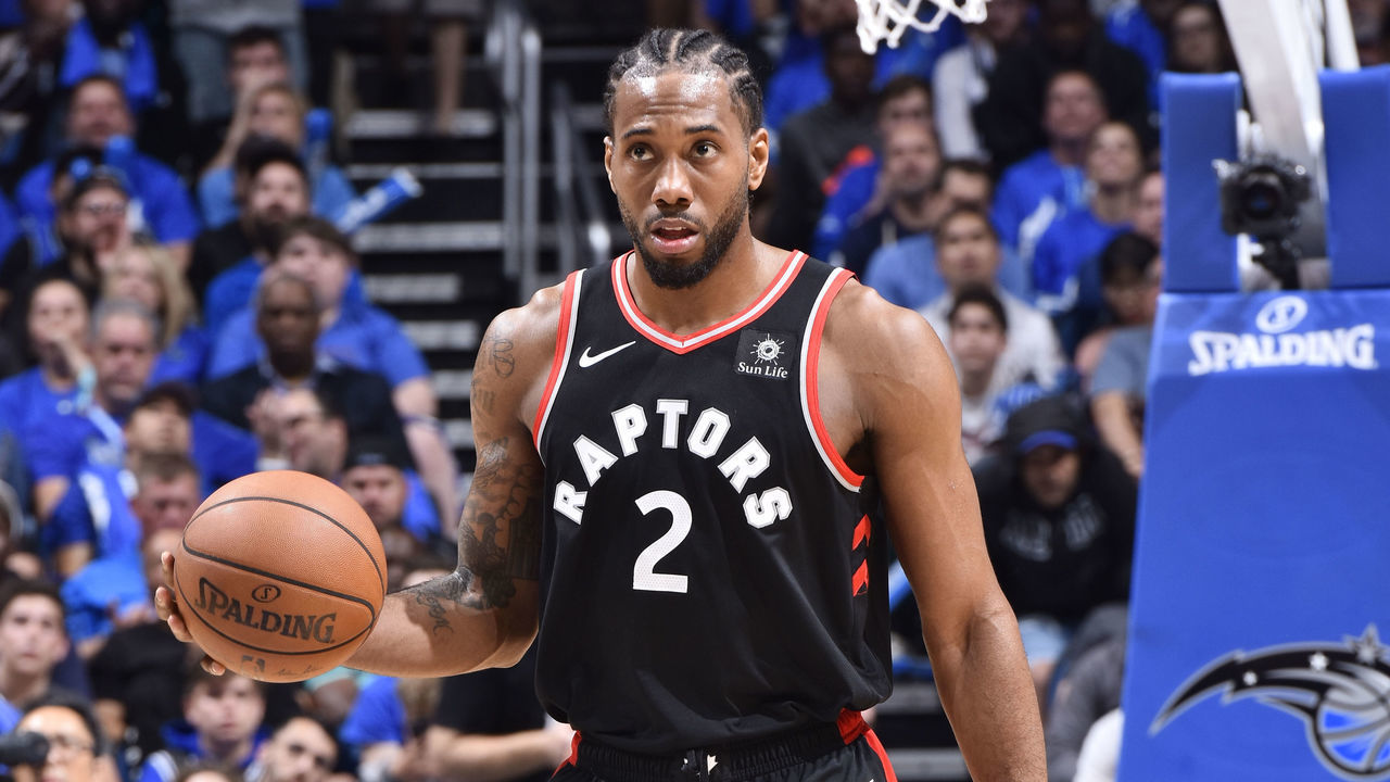 ORLANDO, FL - APRIL 19: Kawhi Leonard #2 of the Toronto Raptors handles the ball against the Orlando Magic during Game Three of Round One of the 2019 NBA Playoffs on April 19, 2019 at Amway Center in Orlando, Florida. Mandatory Copyright Notice: Copyright 2019 NBAE