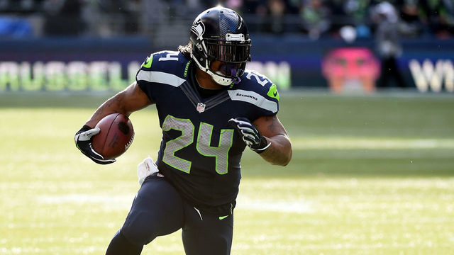 SEATTLE, WA - NOVEMBER 23: Marshawn Lynch #24 of the Seattle Seahawks runs the ball in the first quarter against the Arizona Cardinals during their game at CenturyLink Field on November 23, 2014 in Seattle, Washington.