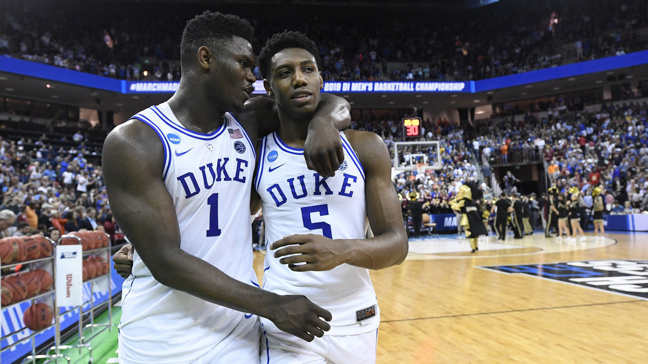 COLUMBIA, SC - MARCH 24: Zion Williamson #1 and RJ Barrett #5 of the Duke Blue Devils walk off the court after their win over the UCF Knights in the second round of the 2019 NCAA Men's Basketball Tournament held at Colonial Life Arena on March 24, 2019 in Columbia, South Carolina.