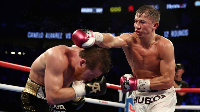 LAS VEGAS, NV - SEPTEMBER 15: Gennady Golovkin punches Canelo Alvarez during their WBC/WBA middleweight title fight at T-Mobile Arena on September 15, 2018 in Las Vegas, Nevada.