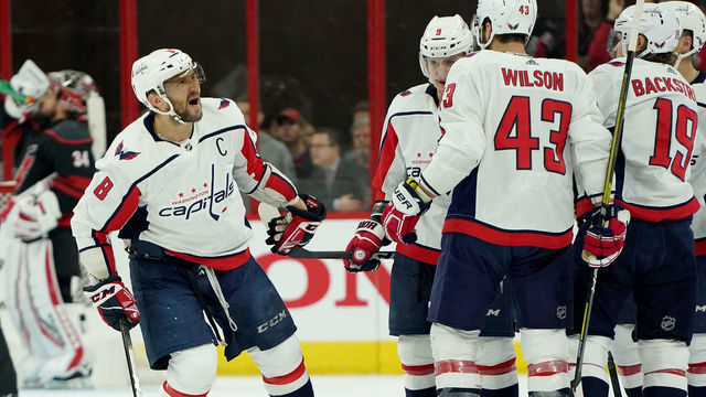 RALEIGH, NC - APRIL 22: Alex Ovechkin #8 of the Washington Capitals celebrates with teammates after scoring a goal in Game Six of the Eastern Conference First Round against the Carolina Hurricanes during the 2019 NHL Stanley Cup Playoffs on April 22, 2019 at PNC Arena in Raleigh, North Carolina.