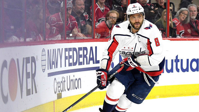 RALEIGH, NORTH CAROLINA - APRIL 22: Alex Ovechkin #8 of the Washington Capitals moves the puck against the Carolina Hurricanes in the second period of Game Six of the Eastern Conference First Round during the 2019 NHL Stanley Cup Playoffs at PNC Arena on April 22, 2019 in Raleigh, North Carolina.