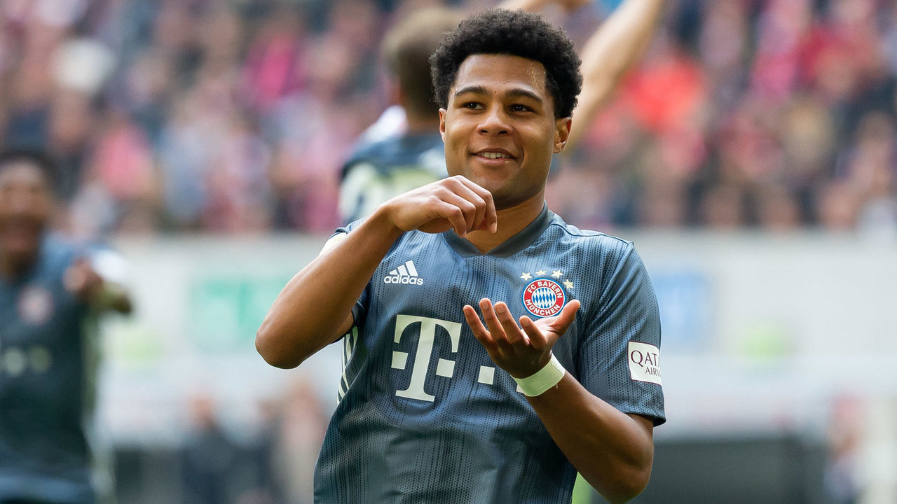 DUESSELDORF, GERMANY - APRIL 14: Serge Gnabry of FC Bayern Muenchen celebrates after scoring his team's third goal during the Bundesliga match between Fortuna Duesseldorf and FC Bayern Muenchen at Esprit-Arena on April 14, 2019 in Duesseldorf, Germany.