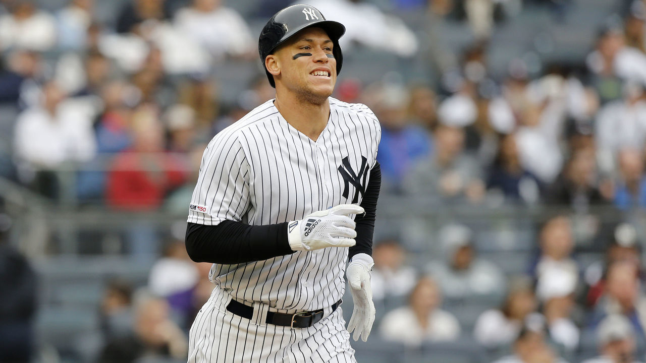 NEW YORK, NEW YORK - APRIL 20: Aaron Judge #99 of the New York Yankees grimaces as he runs out a single during the sixth inning against the Kansas City Royals at Yankee Stadium on April 20, 2019 in New York City.