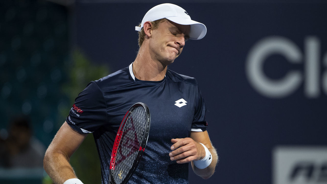 MIAMI GARDENS, FLORIDA - MARCH 28: Kevin Anderson of South Africa waves to the crowd as he leaves the court after losing to Roger Federer of Switzerland in the quarter finals of the men's singles at the Hard Rock Stadium on March 28, 2019 in Miami Gardens, Florida.