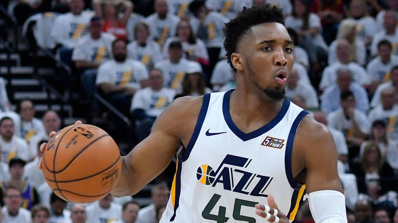 SALT LAKE CITY, UT - APRIL 22: Donovan Mitchell #45 of the Utah Jazz drives to the basket against the Houston Rockets in the first half of Game Four during the first round of the 2019 NBA Western Conference Playoffs at Vivint Smart Home Arena on April 22, 2019 in Salt Lake City, Utah.