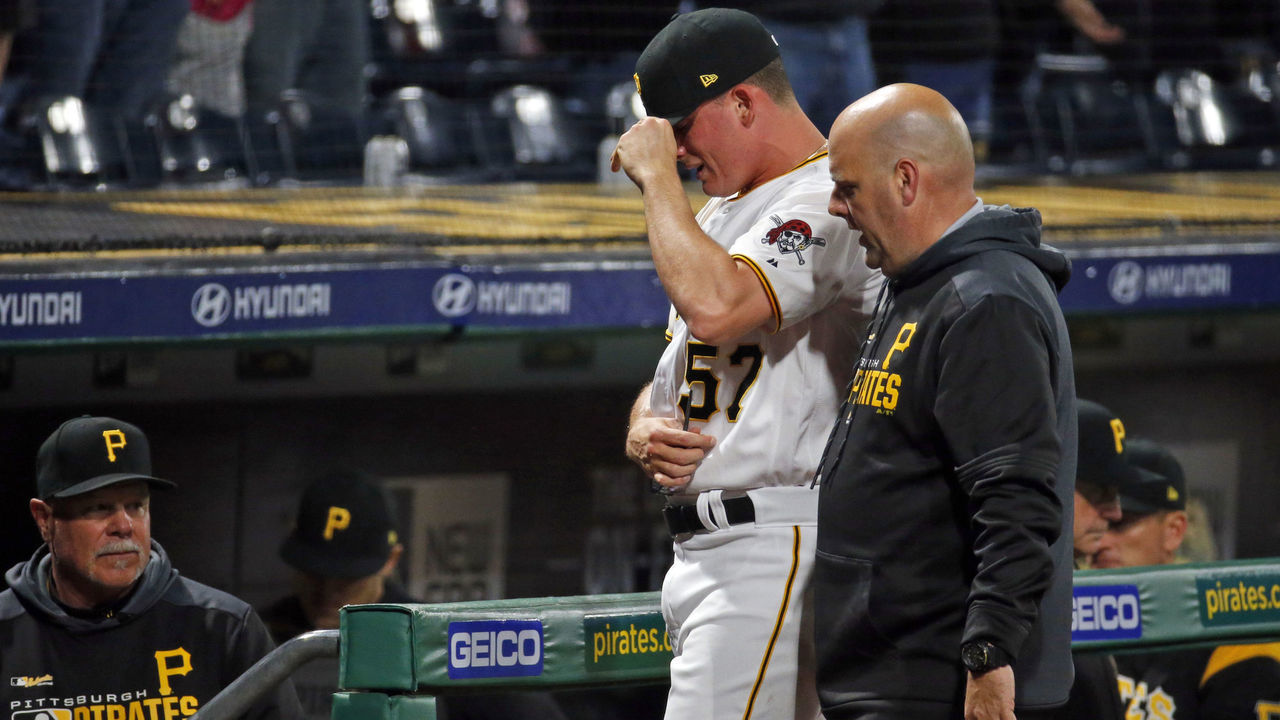 PITTSBURGH, PA - APRIL 22: Nick Burdi #57 of the Pittsburgh Pirates walks off the field injured in the eighth inning against the Arizona Diamondbacks at PNC Park on April 22, 2019 in Pittsburgh, Pennsylvania.